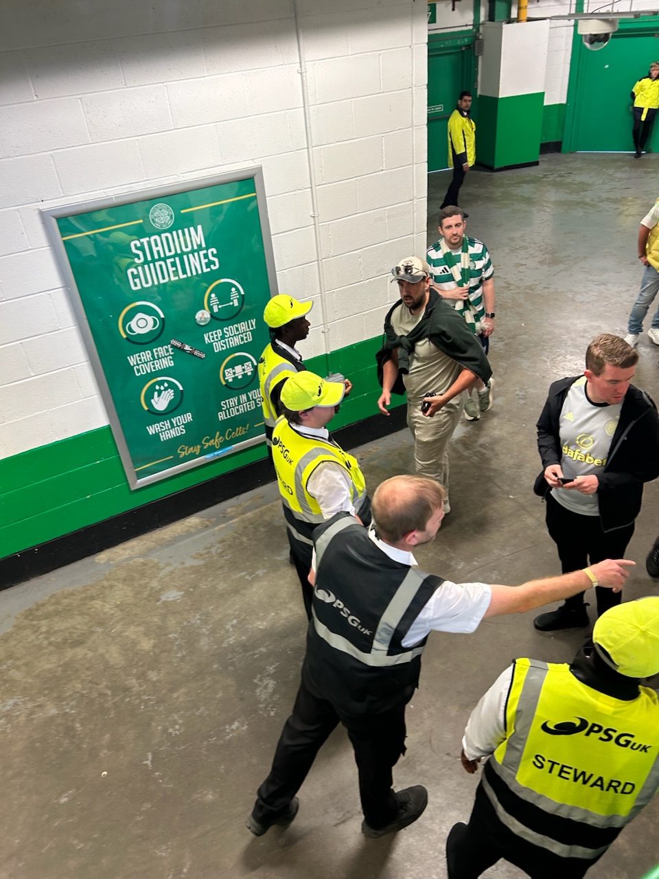 Stewards checking tickets inside Celtic Park