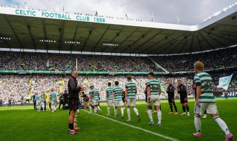 Callum McGregor delivers the trophy