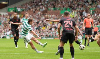 Luke McCowan of Celtic celebrates