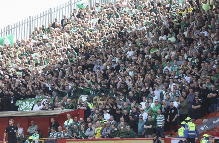 The Celtic support at Pittodrie