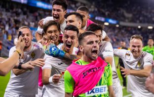 Players of Kairat celebrate