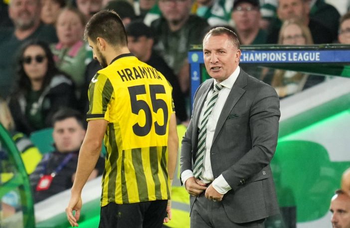 Celtic Manager Brendan Rodgers exchanges words with Valeri Gromyko of Kairat Almaty