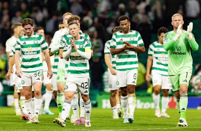 Callum McGregor and his teammates applaud the fans