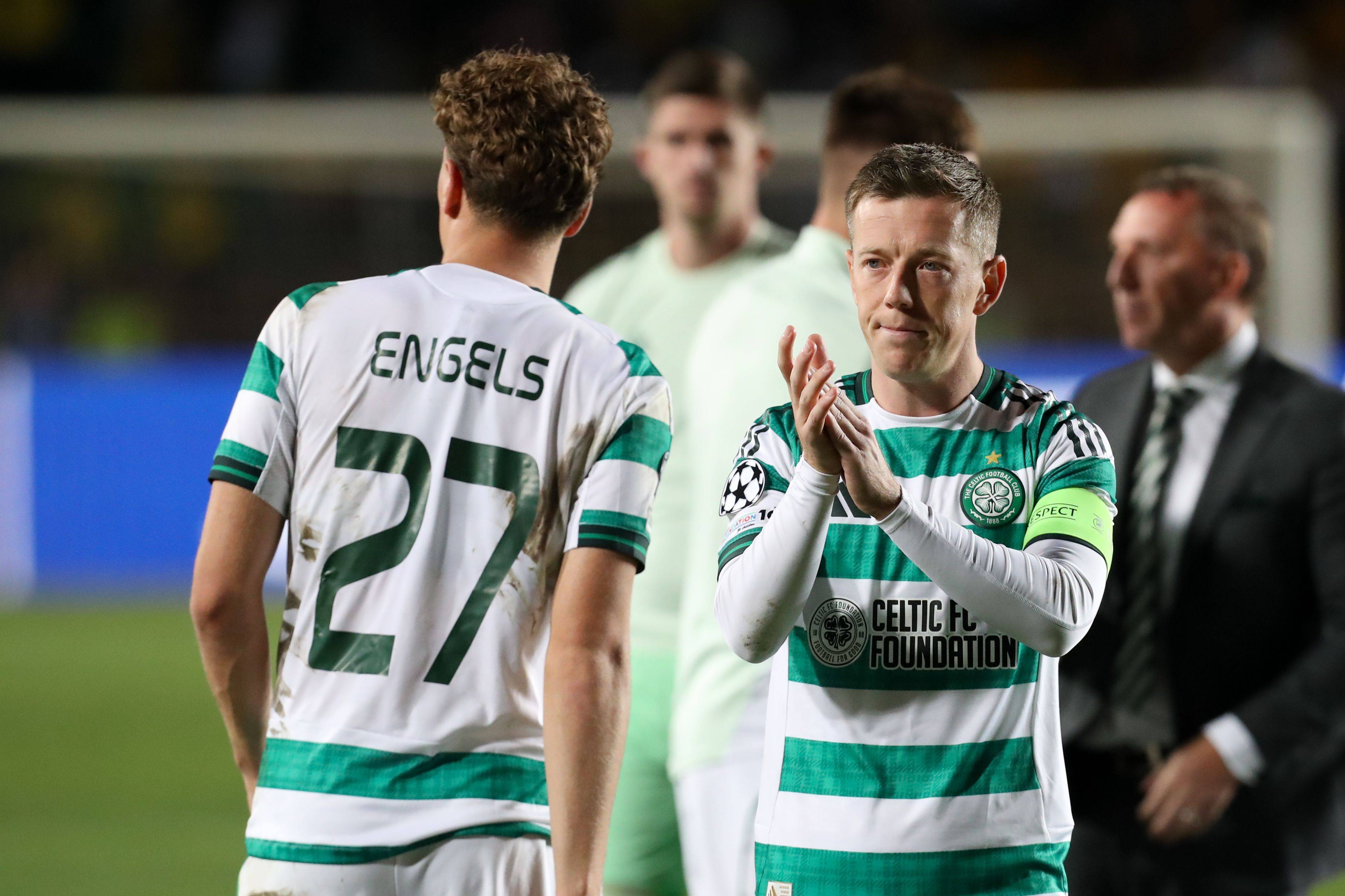Callum McGregor of Celtic applauds travelling fans