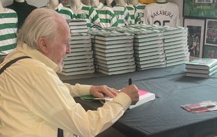 Danny McGrain signing copies of Celtic in the Eighties
