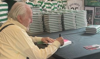 Danny McGrain signing copies of Celtic in the Eighties