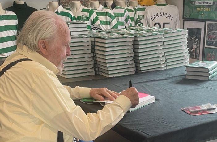 Danny McGrain signing copies of Celtic in the Eighties