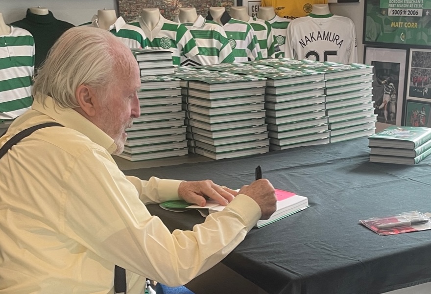 Danny McGrain signing copies of Celtic in the Eighties