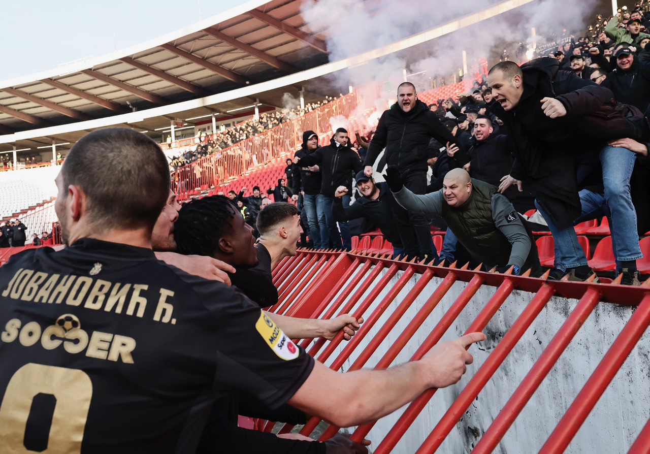  Ibrahim Zubairu (C) of Partizan celebrates