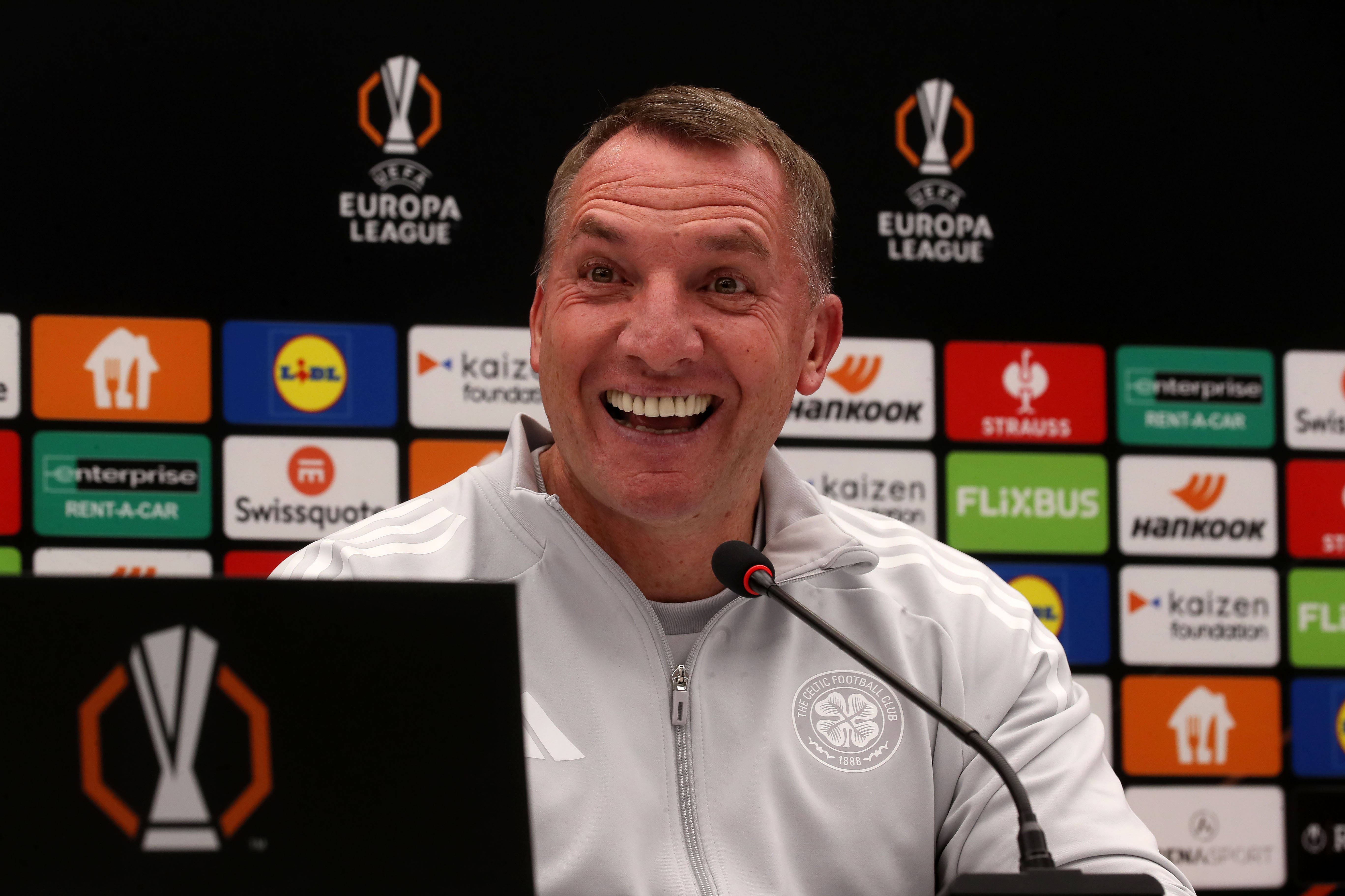 Brendan Rodgers is all smiles in Belgrade