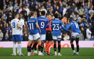 Diomande of theRangers is shown a red card