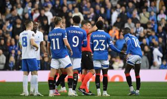 Diomande of theRangers is shown a red card