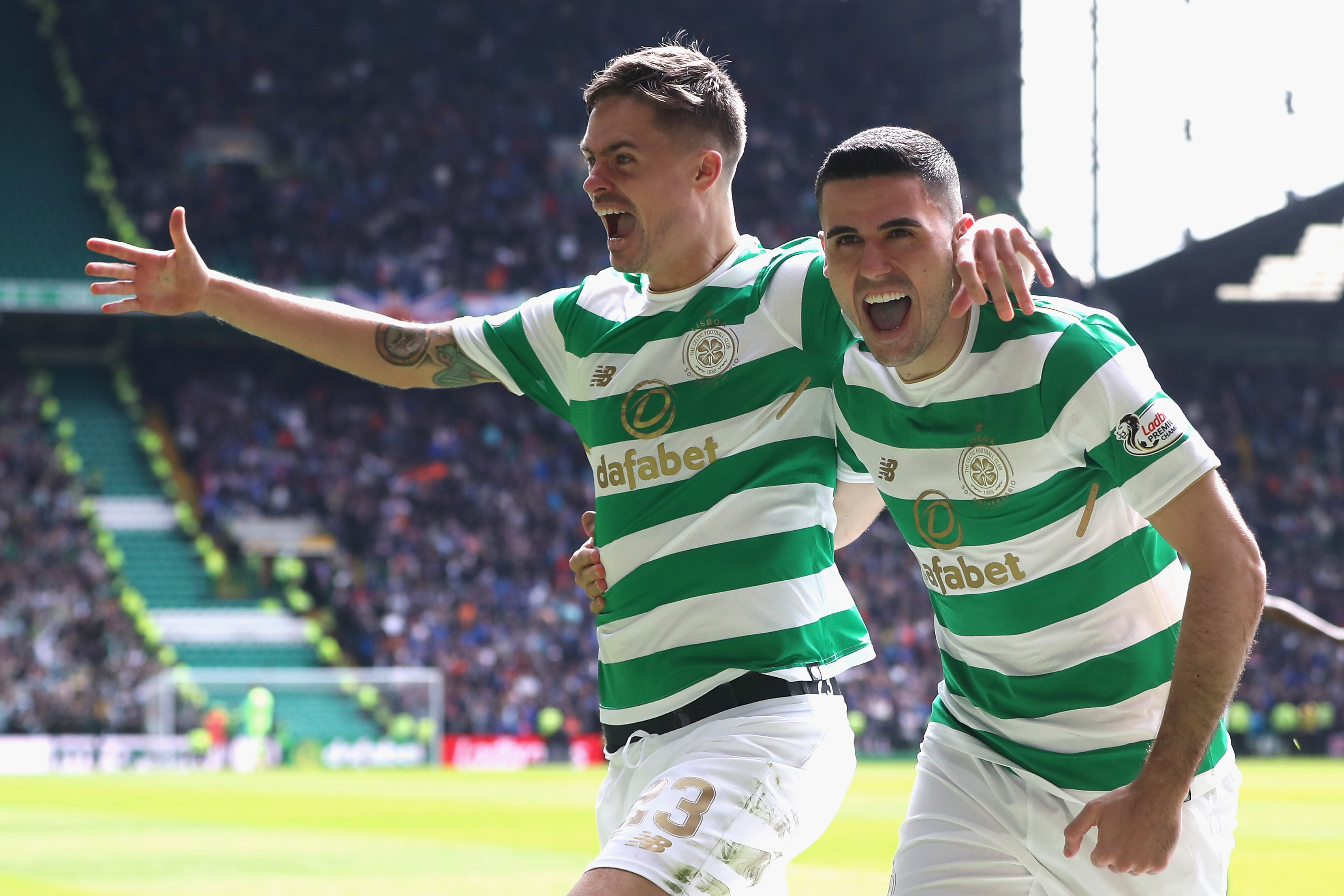 Tom Rogic of Celtic celebrates with Mikael Lustig