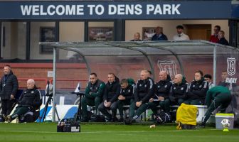 Brendan Rodgers on the Celtic bench at Dens Park.