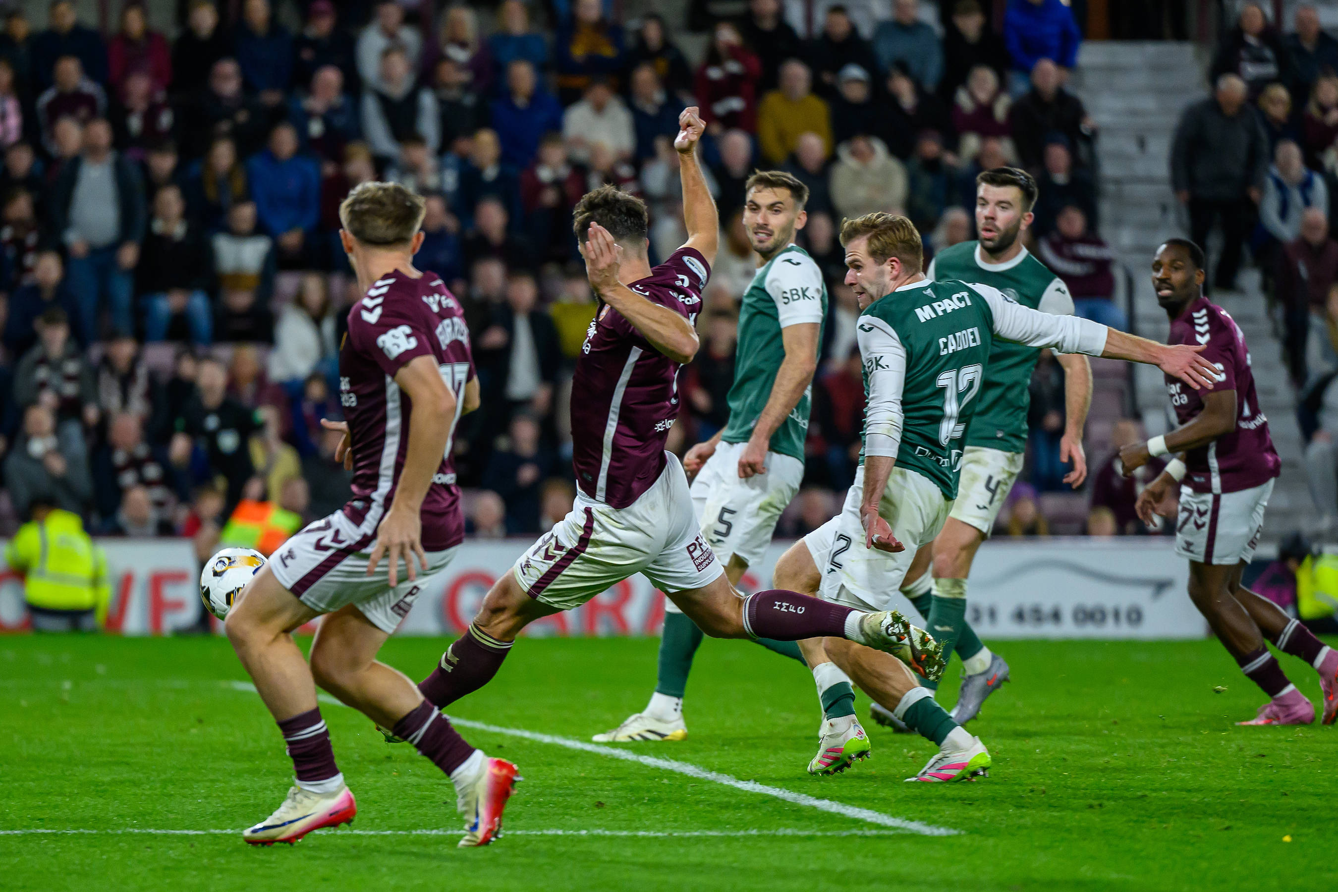 Craig Halkett of Hearts scores the winning goal