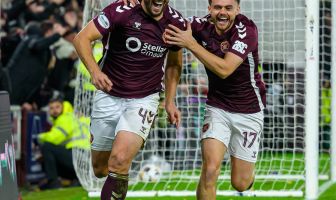 Craig Halkett of Hearts celebrates with Alan Forrest