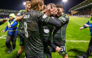 Colby Donovan in the celebrations as Callum McGregor scores a last minute winner.