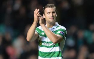 Erik Sviatchenko of Celtic applauds the fans