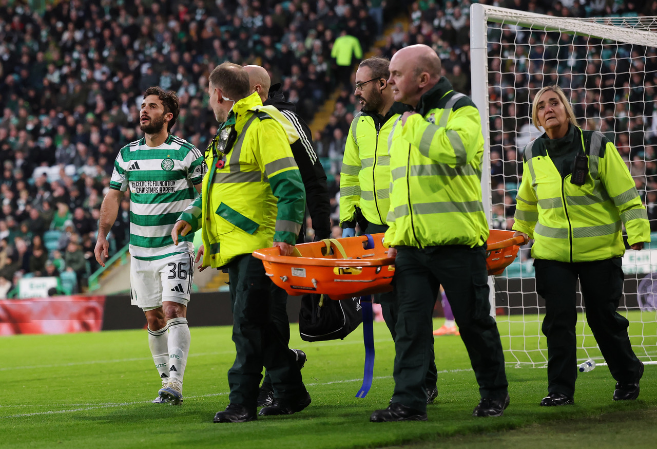 Marcelo Saracchi of Celtic leaves the field injured