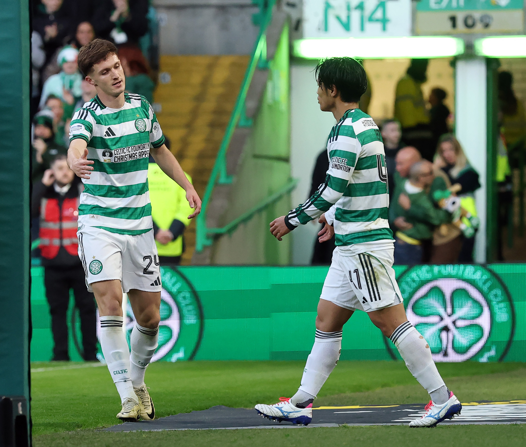 Johnny Kenny celebrates with Reo Hatate 