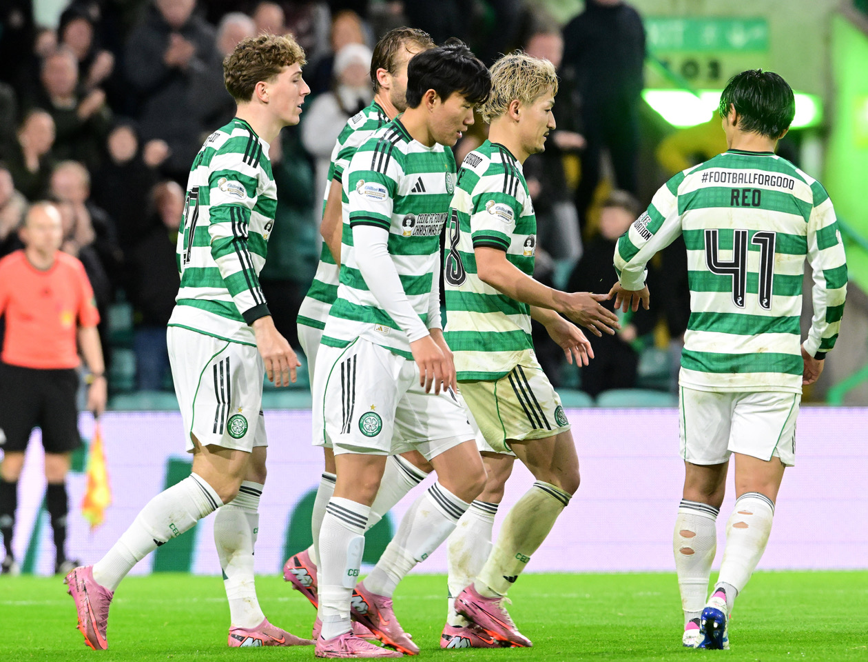 Yang celebrates with Daizen Maeda.