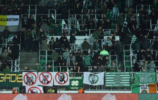 Fans of Celtic settling in inside the stadium