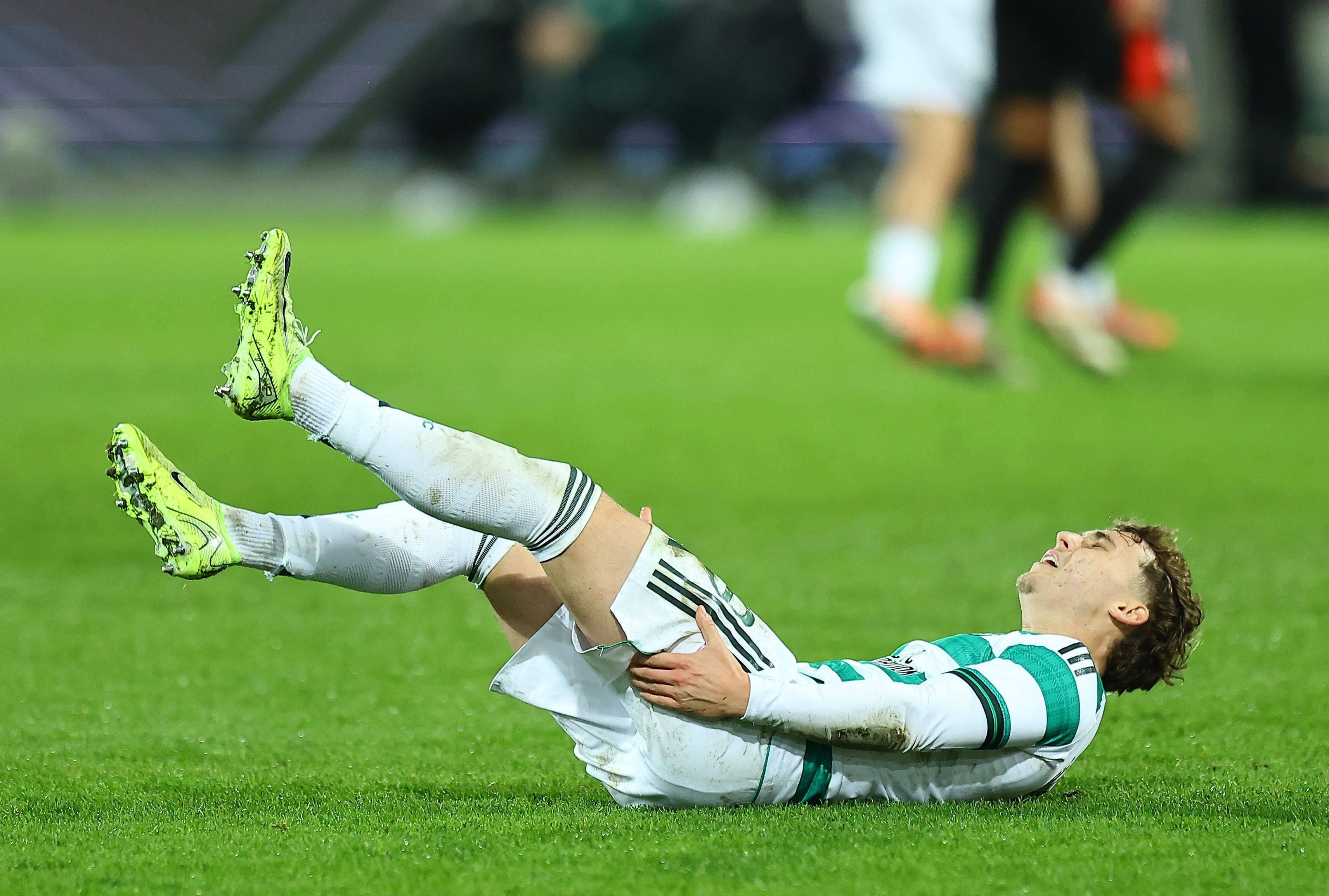 Callum Osmand of Celtic is injured