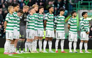Celtic players observe a one minute silence