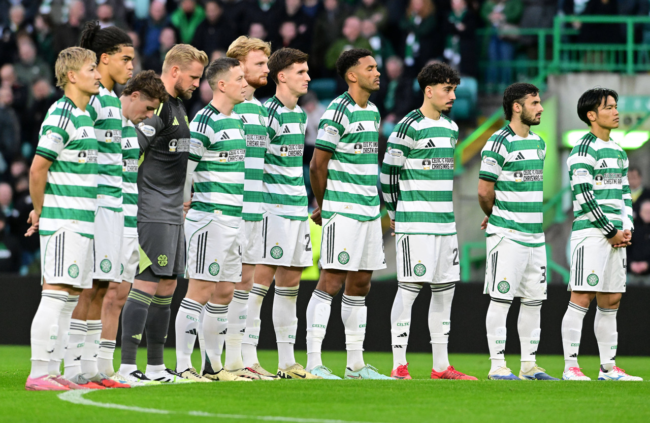 Celtic players observe a one minute silence 