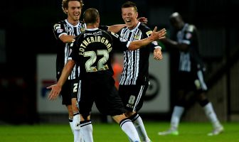 Callum McGregor of Notts County celebrates with Mark Fotheringham
