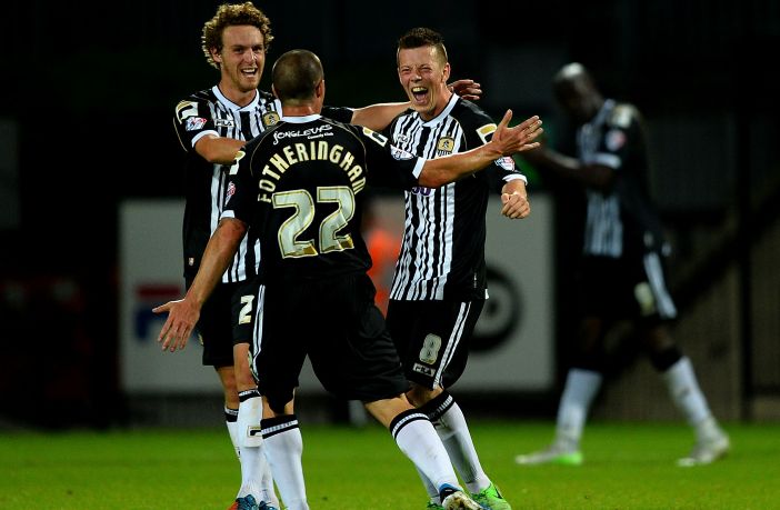Callum McGregor of Notts County celebrates with Mark Fotheringham