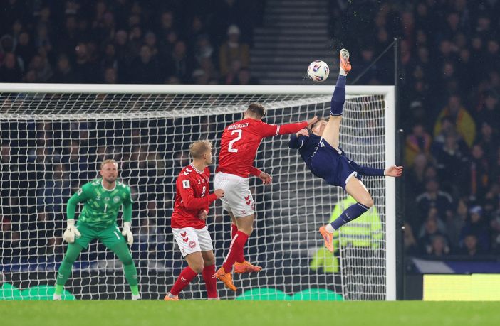 Scott McTominay of Scotland scores