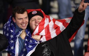 Scotland fans wrapped in a USA flag