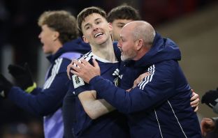 Kieran Tierney celebrates with Steve Clarke