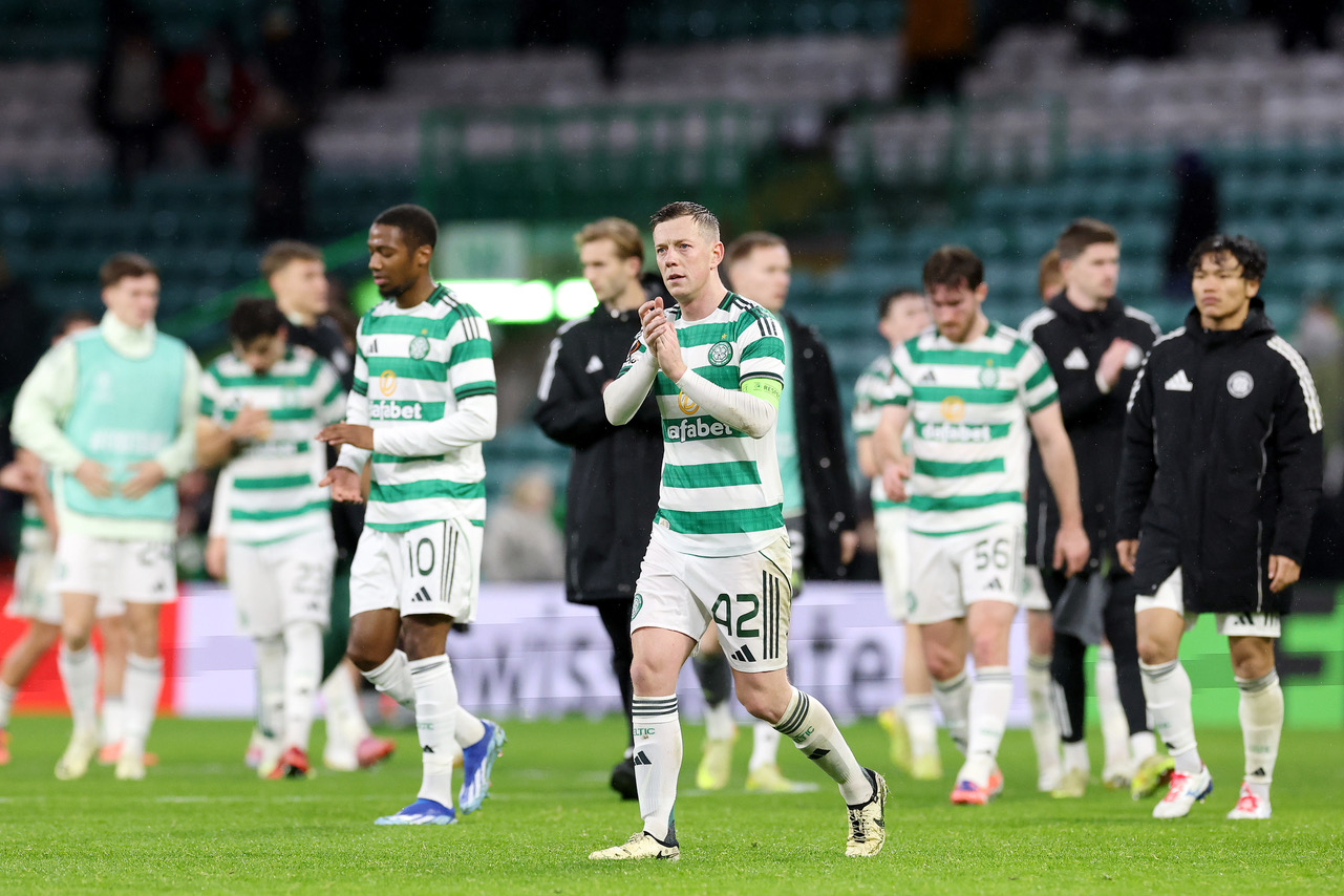 Callum McGregor of Celtic applauds the fans