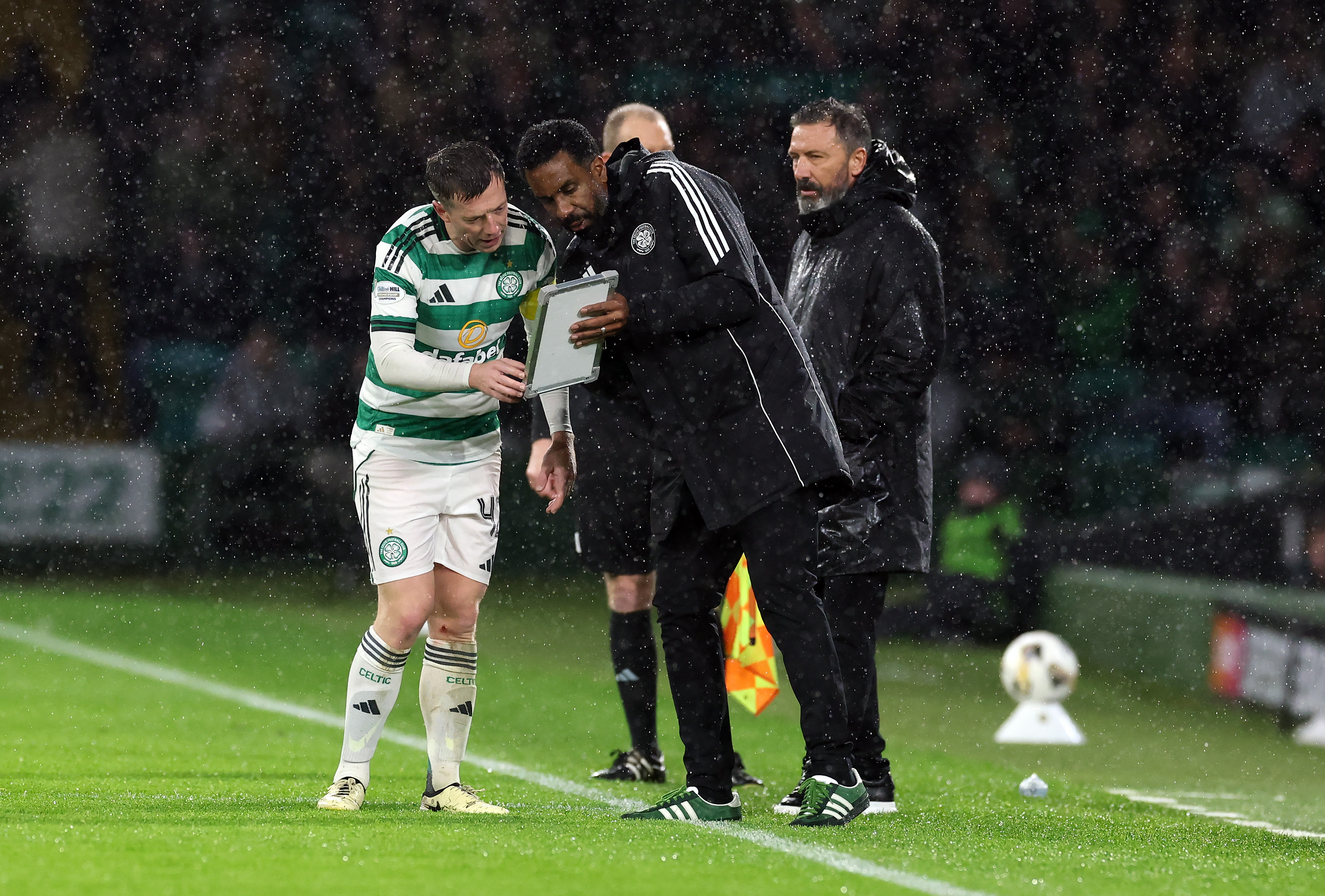 Callum McGregor receiving tactical instructions from Wilfried Nancy