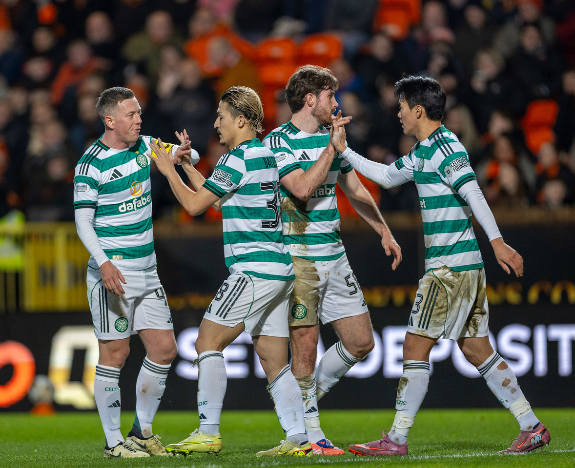 Celtic players celebrate Daizen Maed's opening goal.