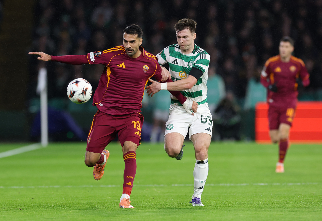 Zeki Celik of AS Roma is challenged by Kieran Tierney