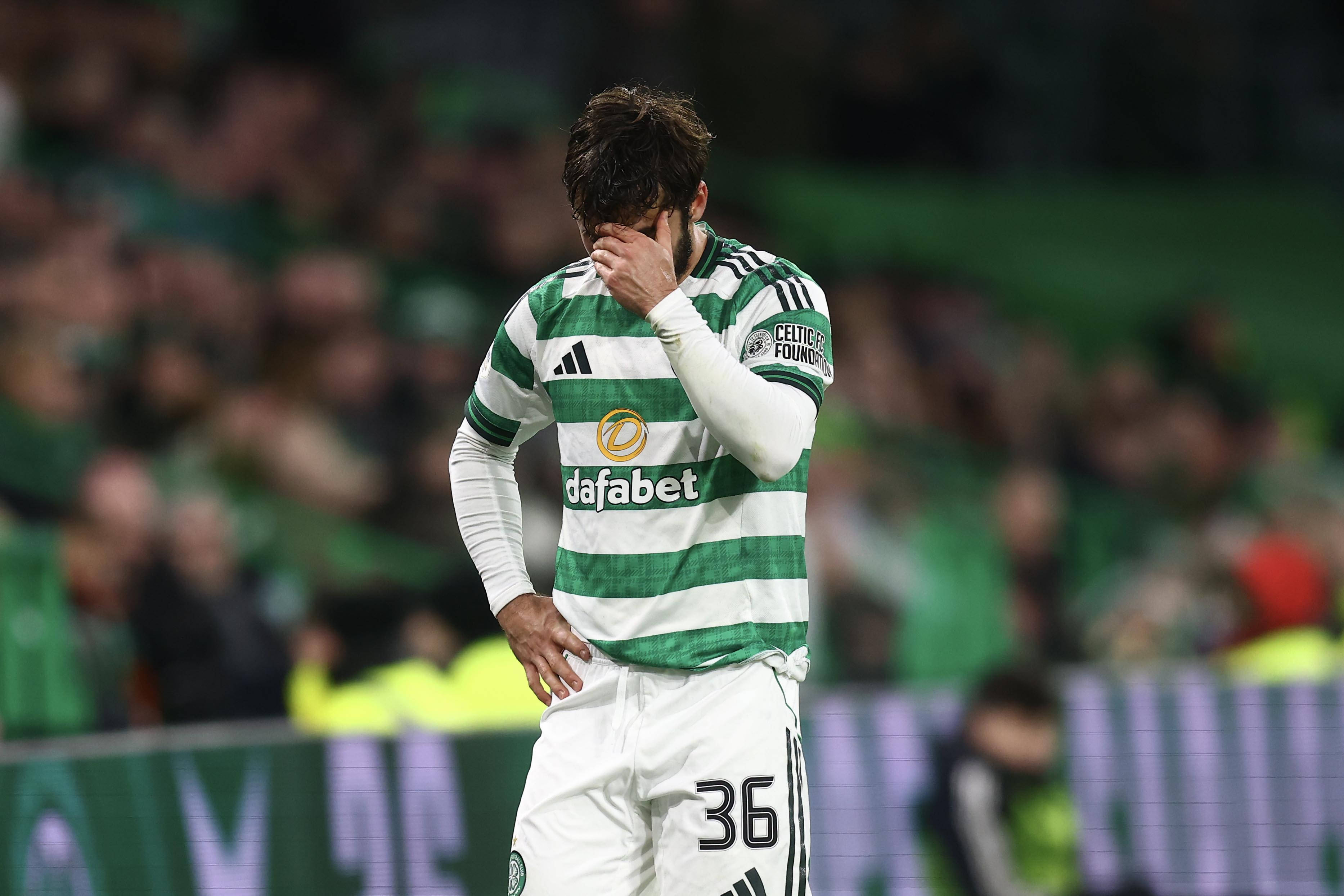 Marcelo Saracchi of Celtic goes off injured