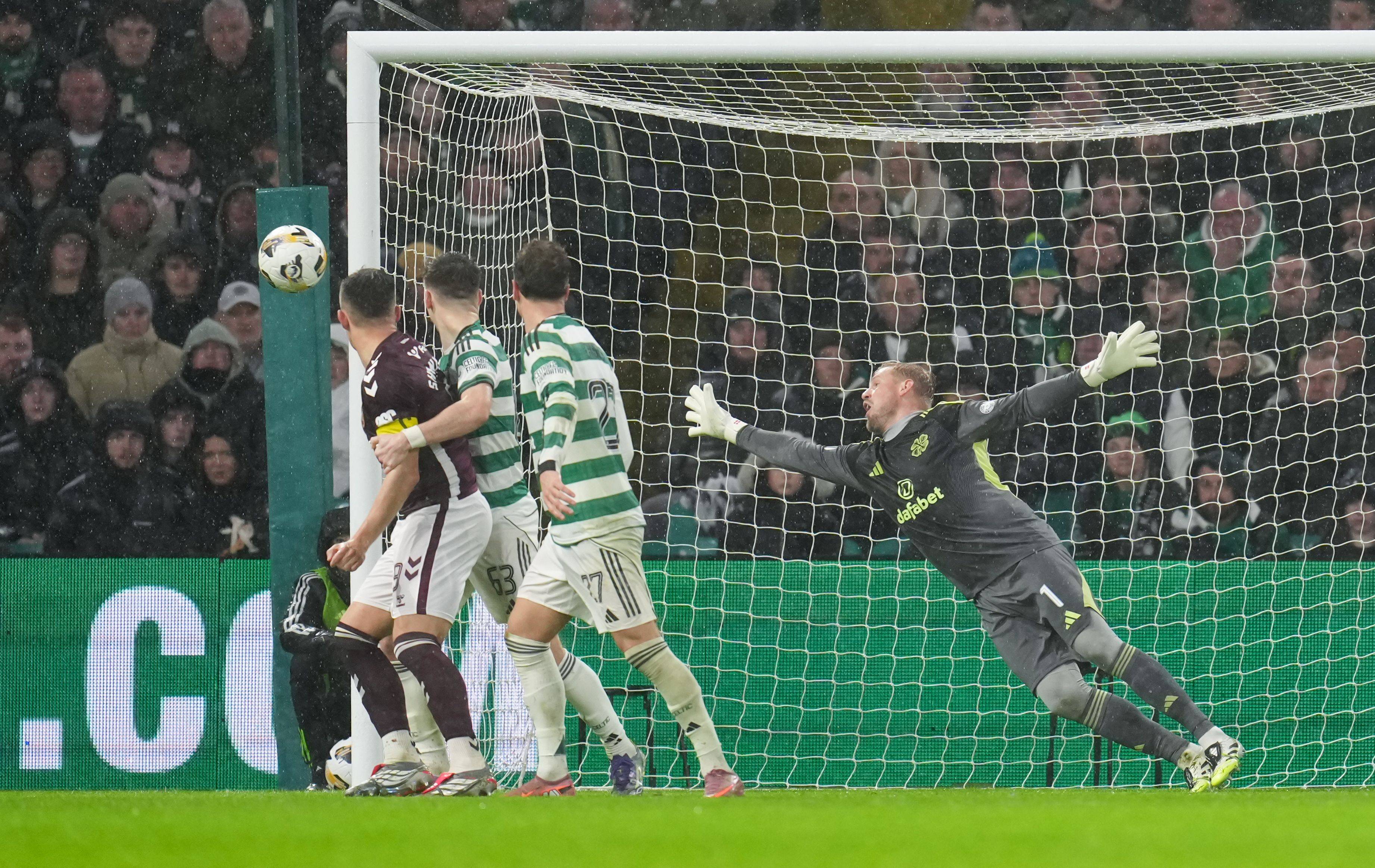 Oisin McEntee of Hearts beats Celtic goalkeeper Kasper Schmeichel 
