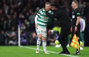 Callum McGregor of Celtic receives instructions from Wilfried Nancy