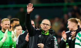 Martin O'Neill salutes the travelling Celtic support.