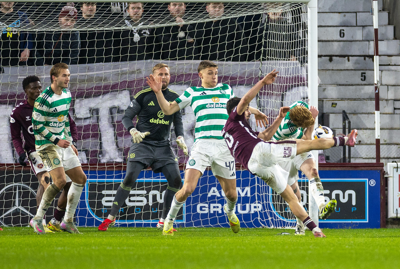 Dane Murray attempts to block the Hearts late equaliser 
