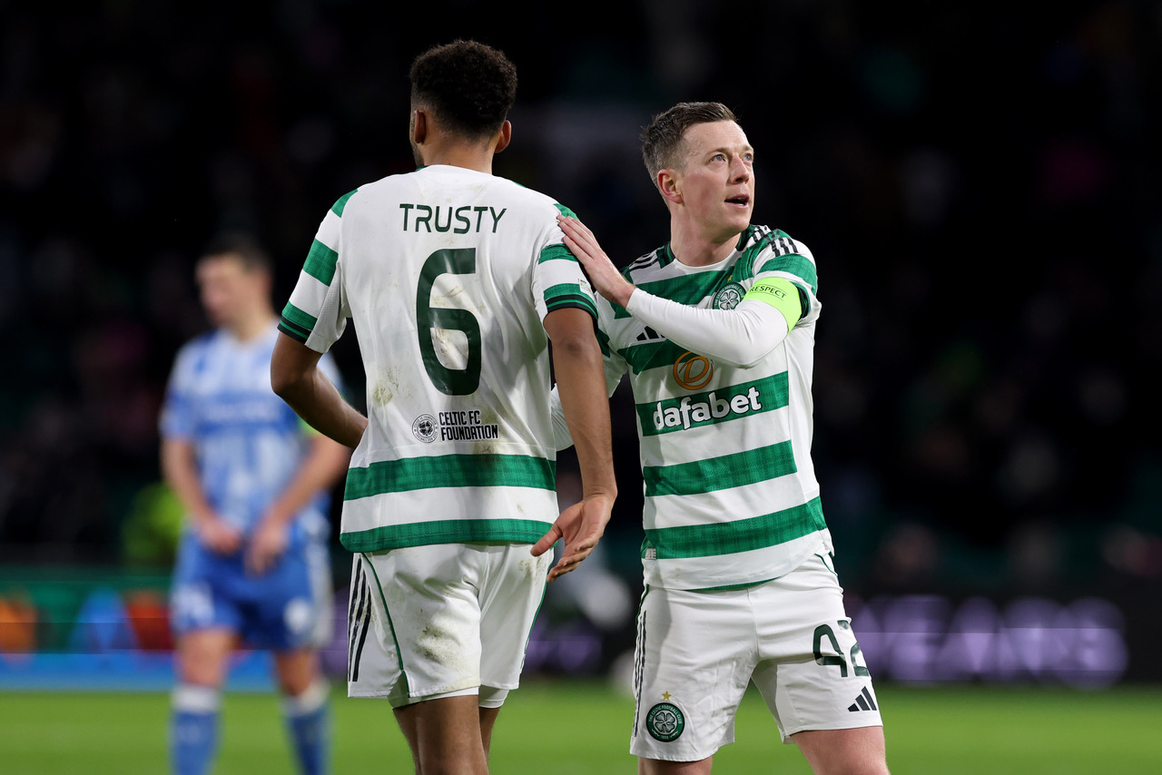Callum McGregor of Celtic celebrates with Auston Trusty after the American scores the fourth Celtic goal 