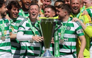 Callum McGregor and James Forrest of Celtic lift the League trophy