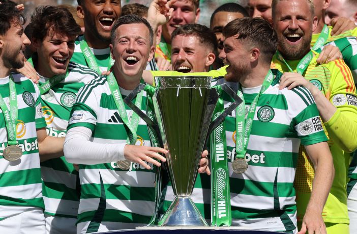Callum McGregor and James Forrest of Celtic lift the League trophy