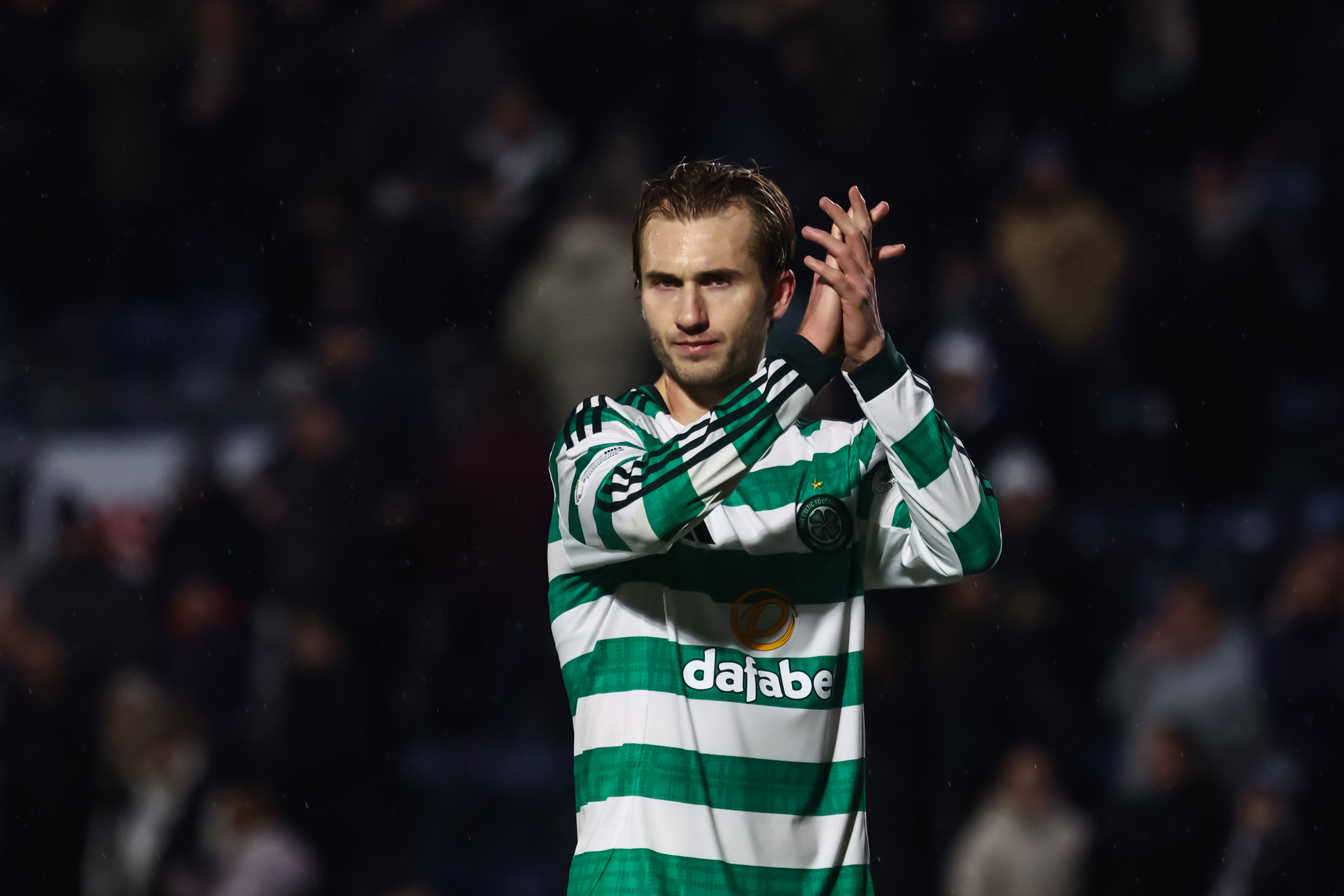 Benjamin Nygren of Celtic applauds the fans 