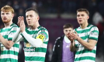 Callum McGregor applauds the Celtic fans
