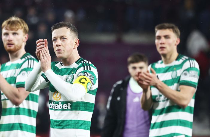 Callum McGregor applauds the Celtic fans