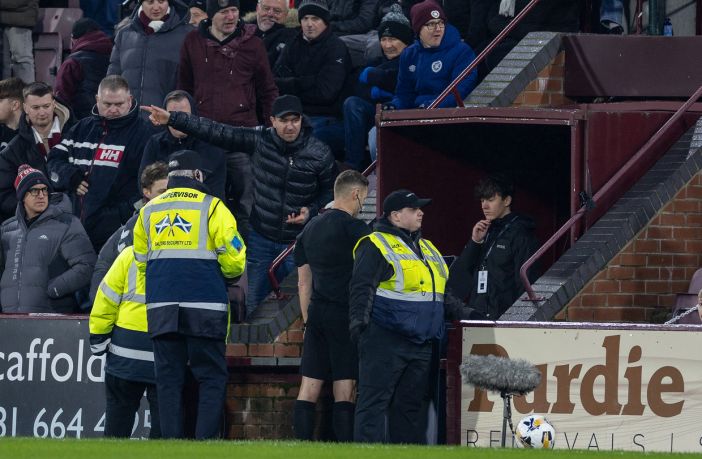 Referee Steven McLean viewing the footage on VAR screen.